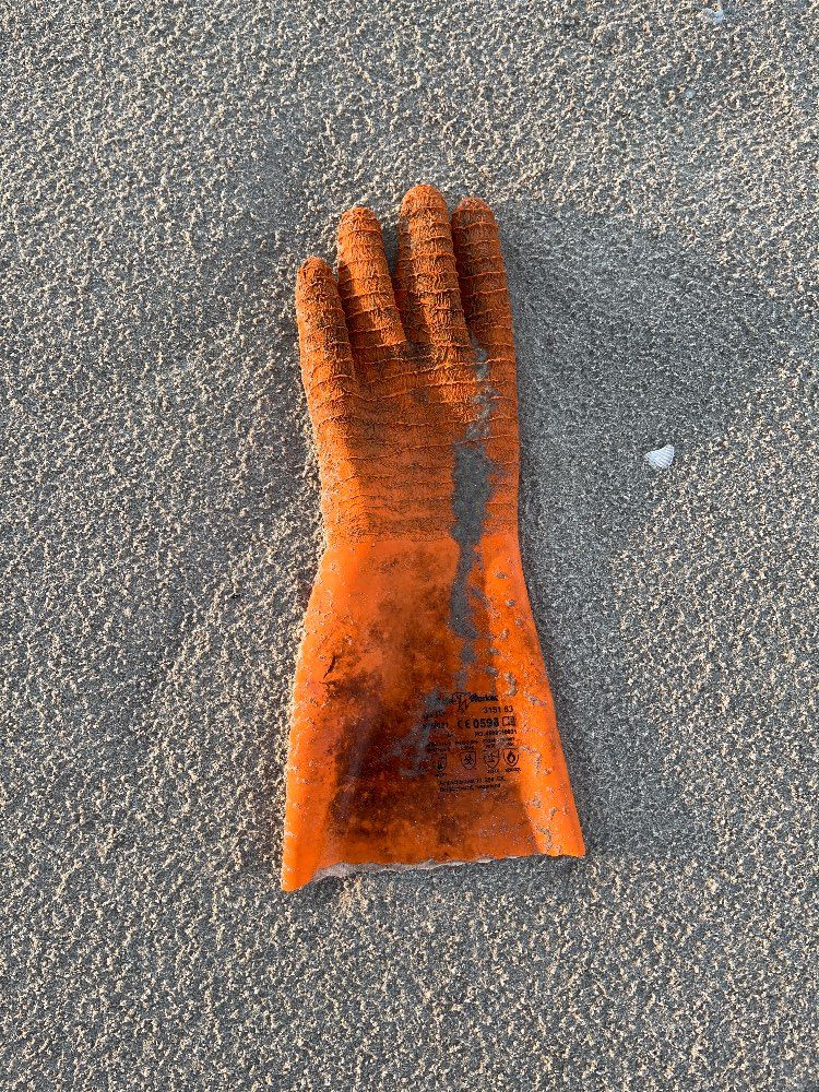 Lost orange glove found in France